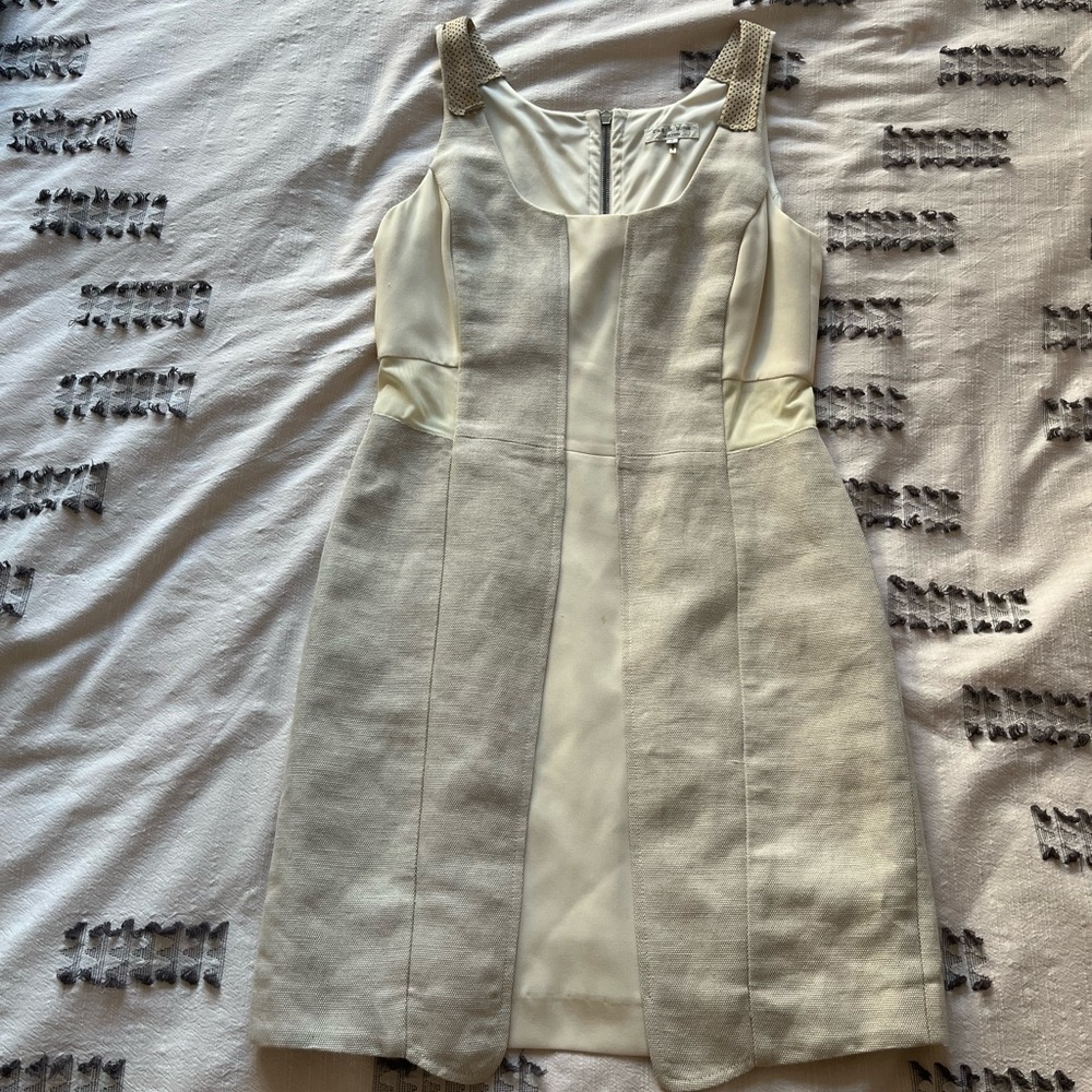 Cream dress with leather detailing